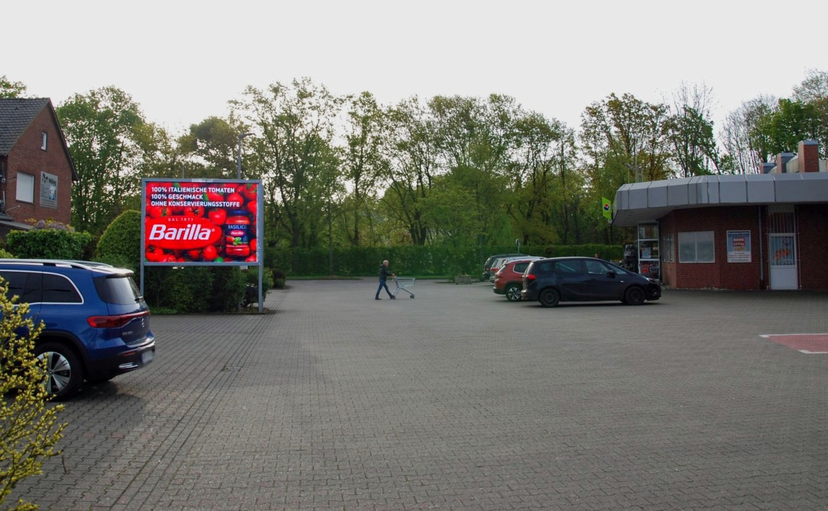 Klever Str. 8-10 /Rewe/geg. Eingang/Sicht EWU