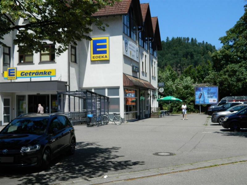 Hauptstr.  82/Bahndamm li. Si. Eing./Edeka