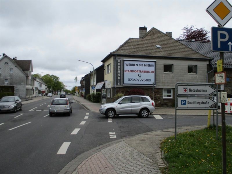 Hauptstr.  50/Quadfliegstr. quer
